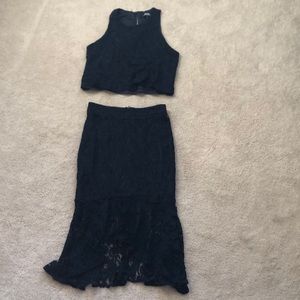 Navy two piece crop top with slight high low skirt